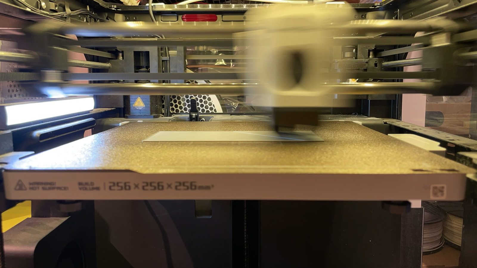 Inside view of the Bambu Lab P1P build chamber and moving print head