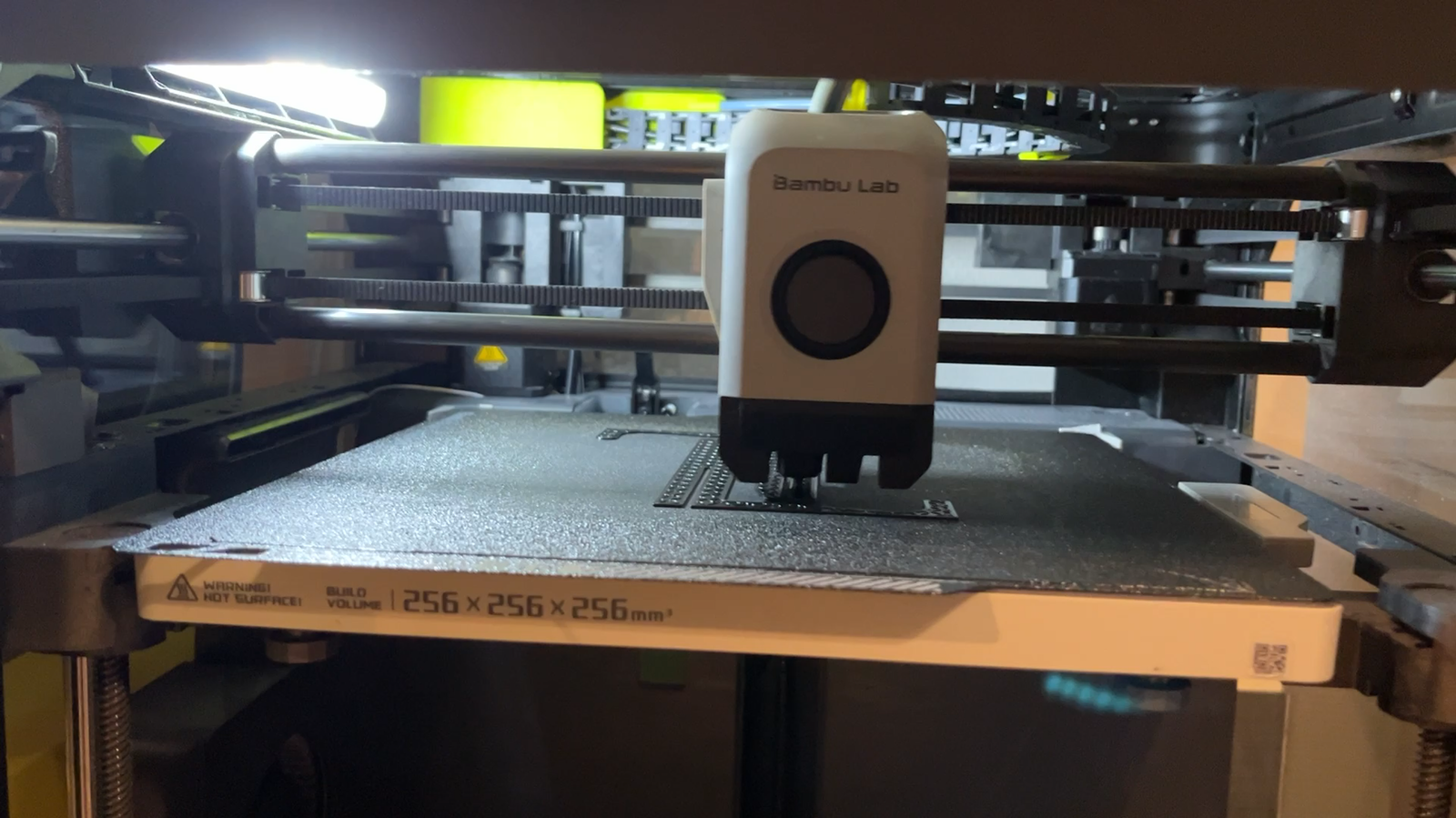 Bambu Lab P1P print head working above the build plate